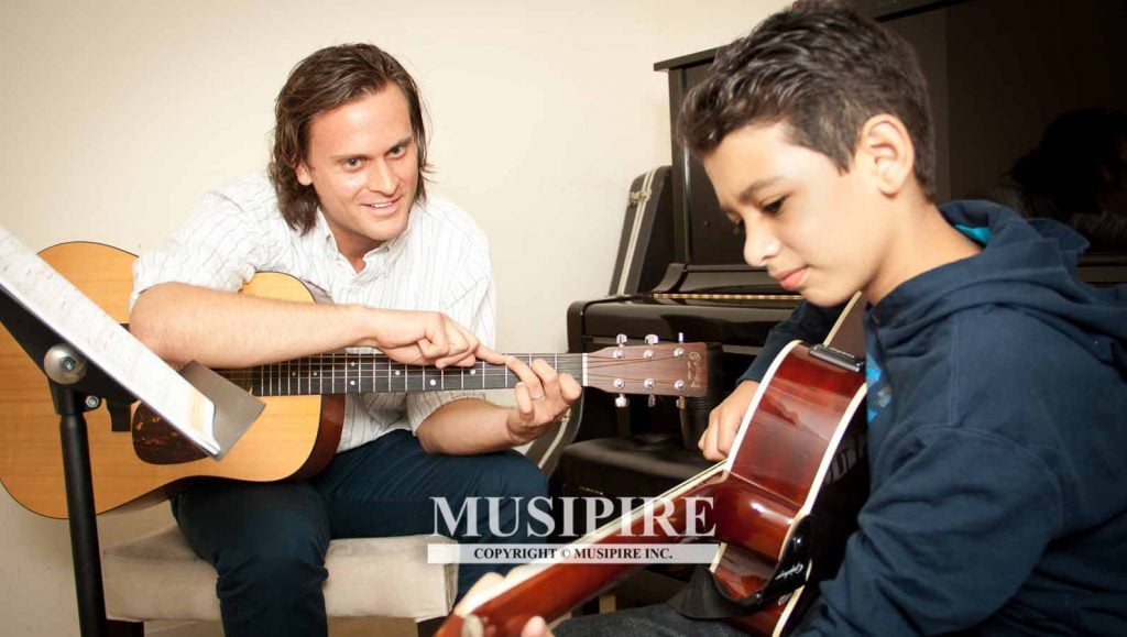 Guitar Lesson in Queens NY | Musipire New York Music School & Academy ...