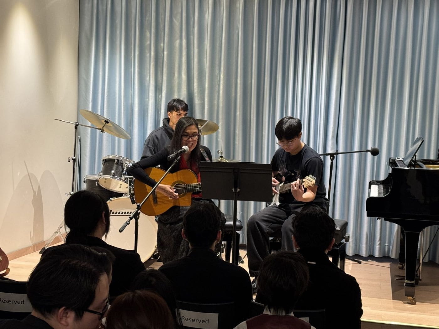 Student guitar ensemble on stage